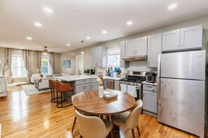 Fridge, microwave, oven, stovetop - In-Unit Laundry | Your Family & Friends Space (Boston)