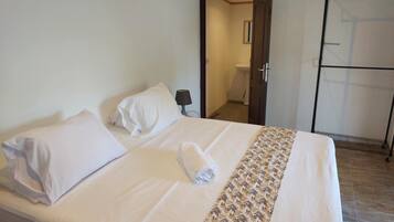 Hypo-allergenic bedding, blackout curtains, iron/ironing board, WiFi