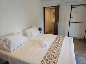 Hypo-allergenic bedding, blackout drapes, iron/ironing board, WiFi