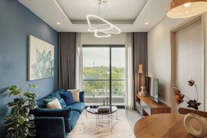 Superior Apartment, 2 Bedrooms, Kitchen, City View | Living area | 42-inch flat-screen TV with cable channels - New City Thu Thiem D2 (Ho Chi Minh City)