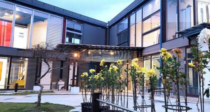 Familyroom102 Garden View / Asahi Chiba