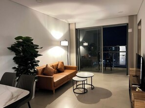 Superior Apartment, 2 Bedrooms, Kitchen, City View | Living area | 35-inch flat-screen TV with cable channels - The Sky 89 Panorama D7 (Ho Chi Minh City)