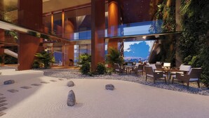A modern indoor space with a seating area, a staircase, and a view of the cityscape. - The Sky 89 Panorama D7 (Ho Chi Minh City)