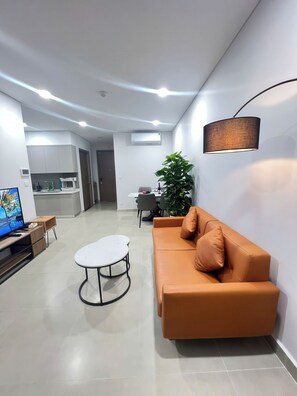 Superior Apartment, 2 Bedrooms, Kitchen, City View | Living area | 35-inch flat-screen TV with cable channels - The Sky 89 Panorama D7 (Ho Chi Minh City)