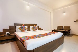 ห้องดีลักซ์ | ผ้าปูที่นอนฝ้ายอียิปต์, เครื่องนอนระดับพรีเมียม, ตู้นิรภัยในห้องพัก