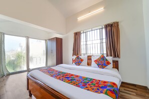 Premium Room | Egyptian cotton sheets, premium bedding, iron/ironing board, free WiFi