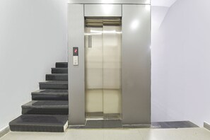 An elevator with a digital display showing the number 2.