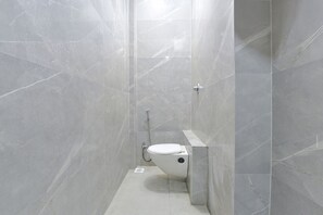 Shower, rainfall showerhead, towels, toilet paper