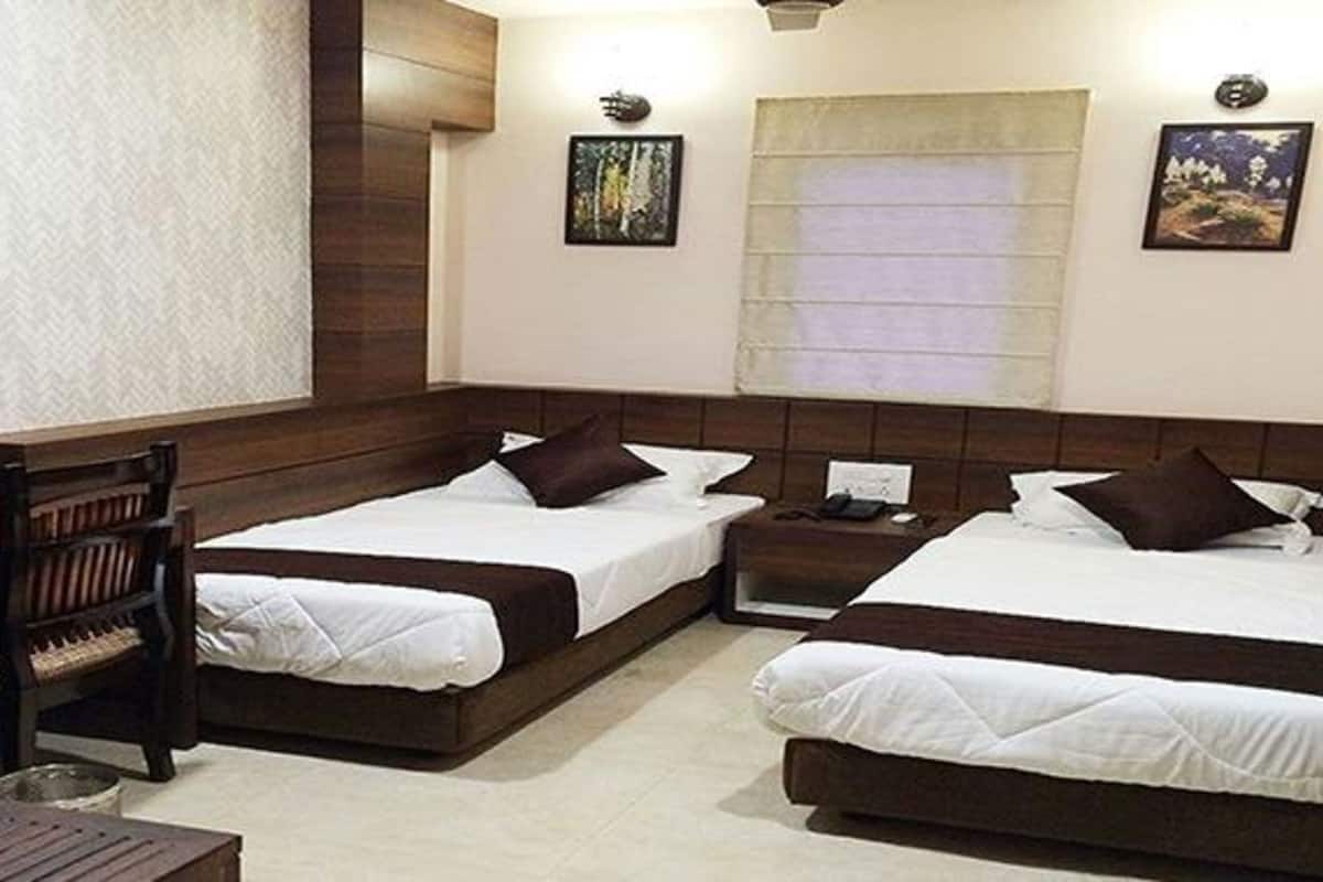 Deluxe kamer | Lakens van Egyptisch katoen, luxe beddengoed, een kluis op de kamer