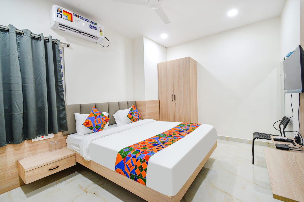 Deluxe kamer | Lakens van Egyptisch katoen, luxe beddengoed, een kluis op de kamer