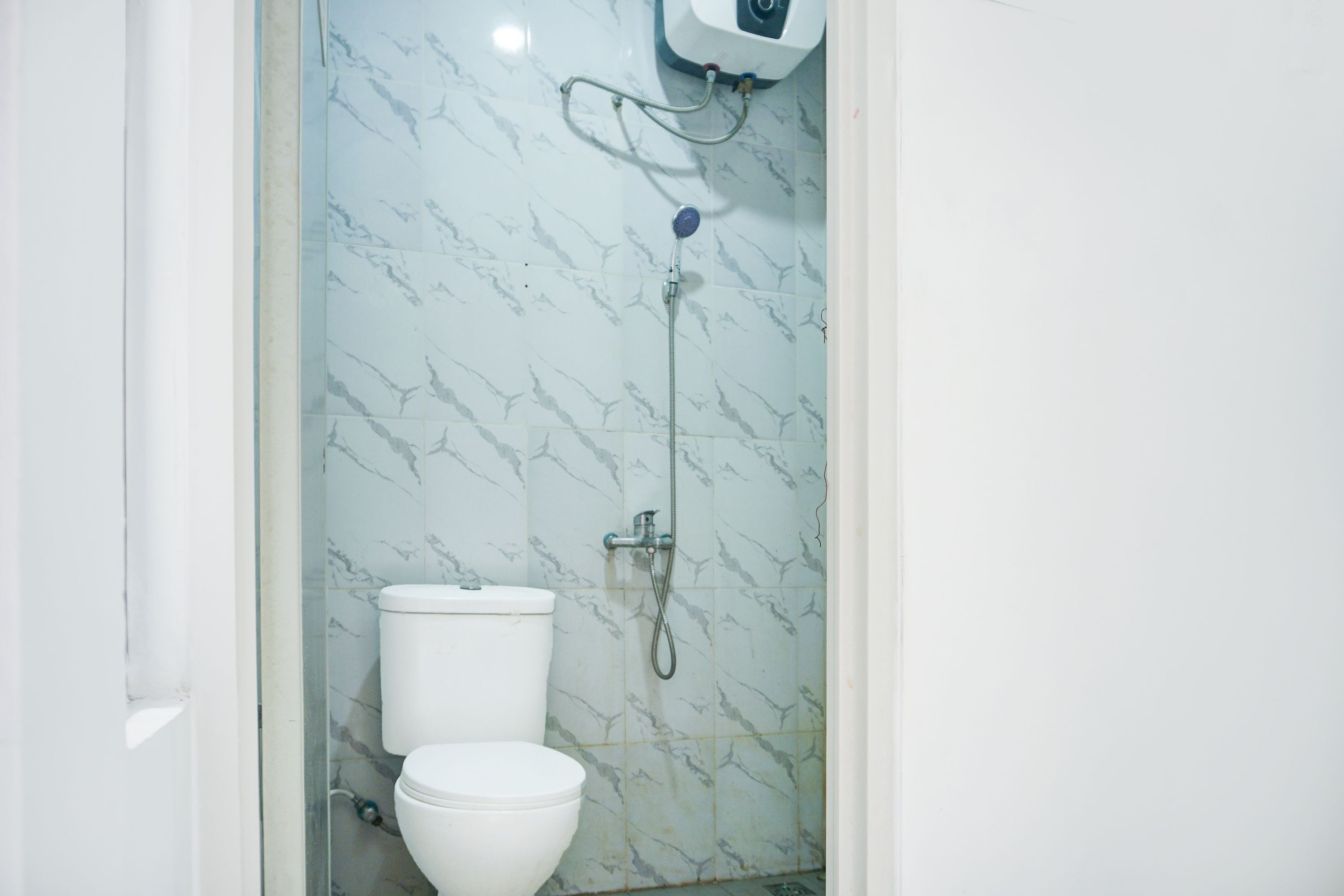 Kamar Double Deluks | Kamar mandi | Shower dan handuk