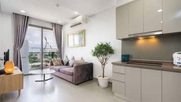 Superior Apartment, 1 Bedroom, Kitchen, City View | Living area | 42-inch flat-screen TV with cable channels