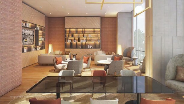 A modern lounge area with a glass table, comfortable seating, a bookshelf, and a large window. - The Antonia Apartments - Korea Town D7 (Ho Chi Minh City)