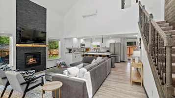 Smart TV, fireplace, books