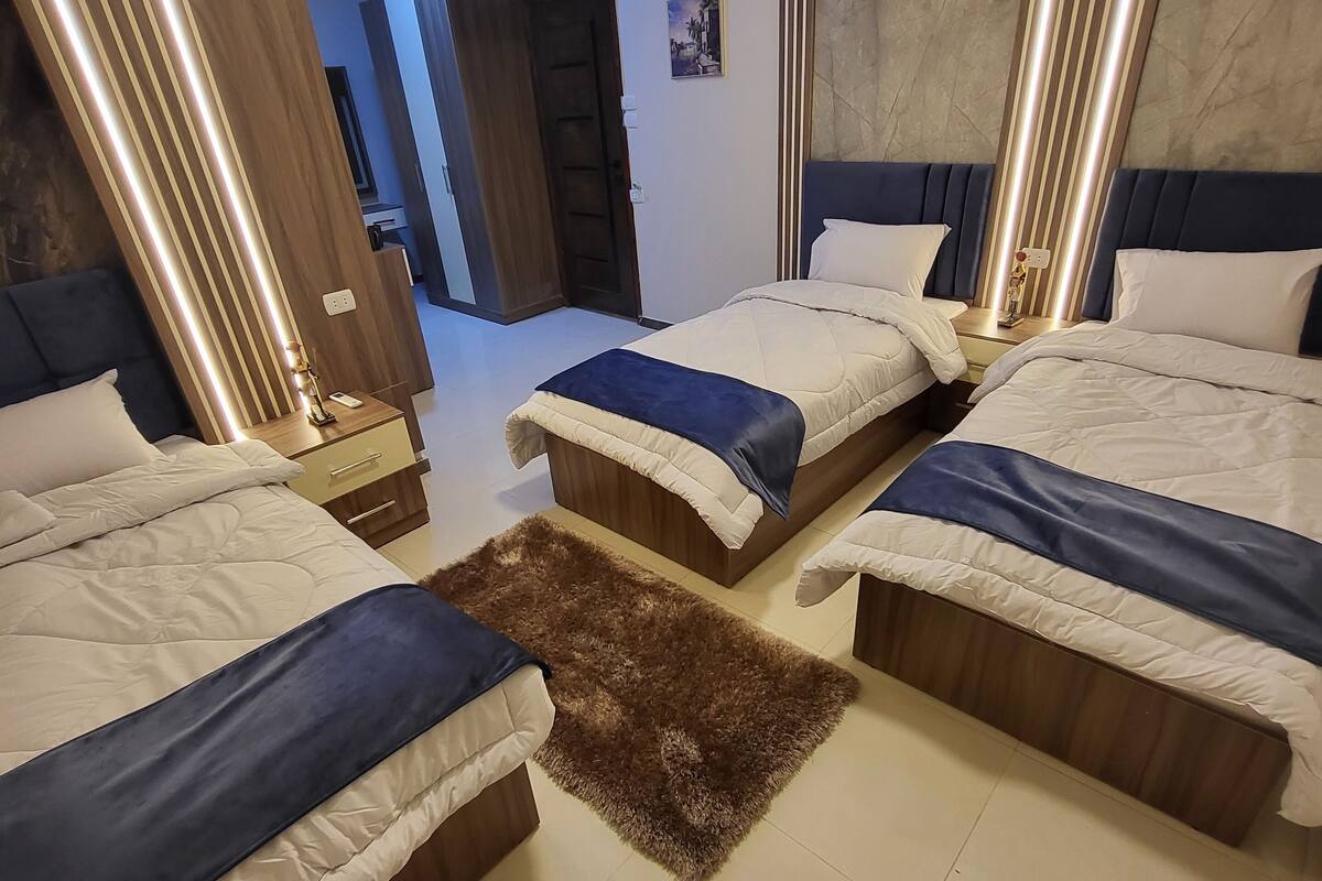 Triple Room, Balcony, City View | Minibar, blackout drapes, soundproofing, iron/ironing board (on request)