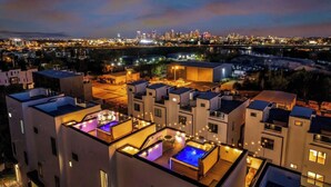 A modern hotel with rooftop pools and a city skyline view. - Nashville escape with hot tub, karaoke lounge & makeup bar, sleeps 12 (Nashville)