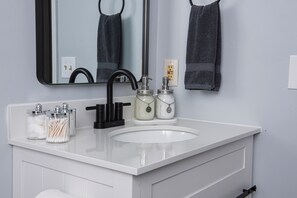 Hair dryer, towels, soap, shampoo