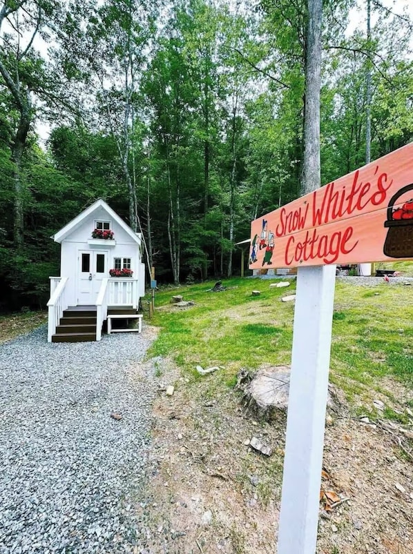 Exterior - Snow White Cottage by Creek – Cozy Retreat with Fireplace, Petting Zoo & Firepit (Hayesville)