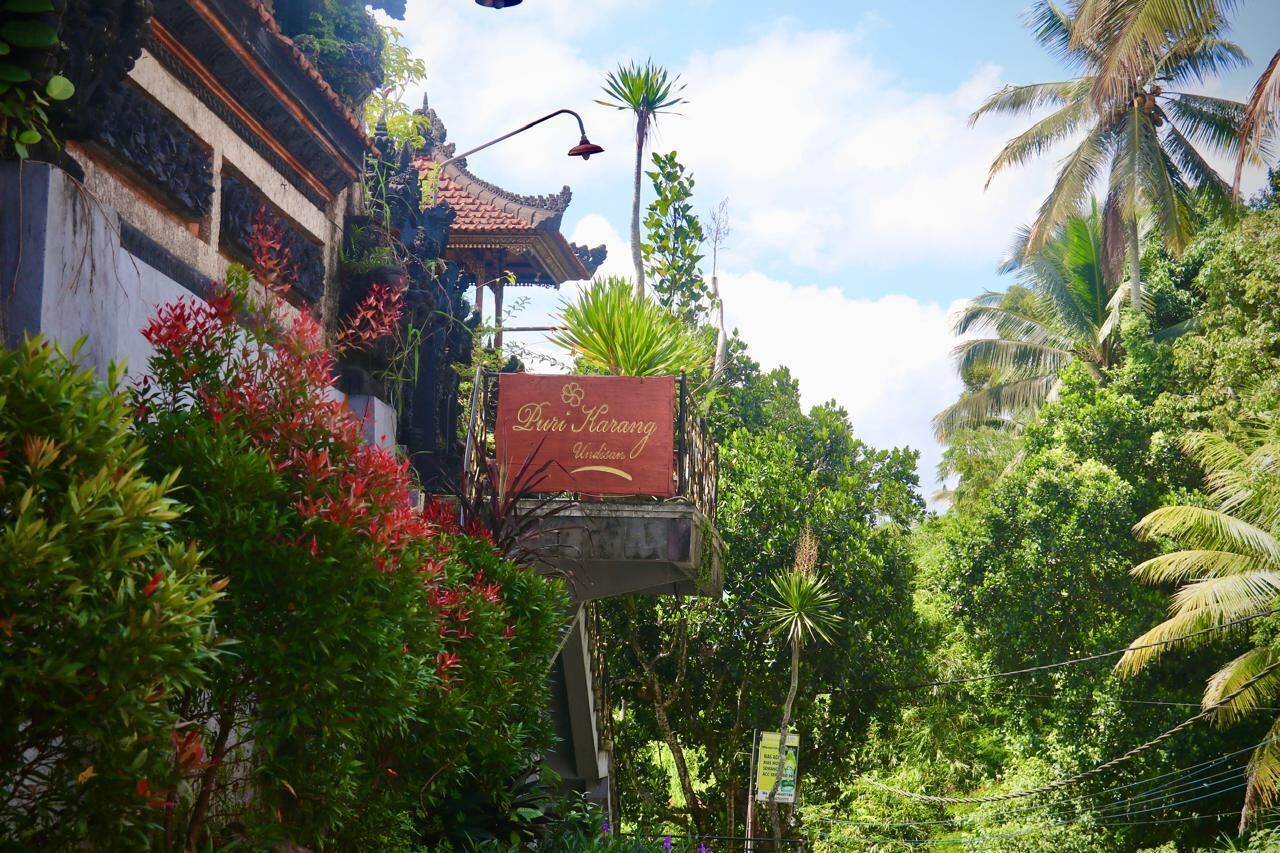 A traditional building with a sign that reads "Puri Harang."