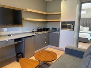 Family Room | Private kitchenette | Mini-fridge, microwave, stovetop, toaster