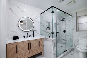 Shower, hair dryer, towels, soap