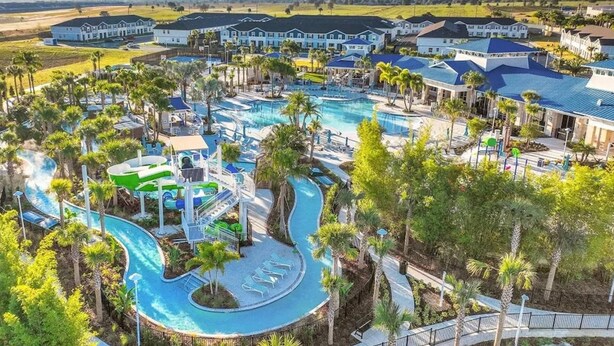 A resort with multiple swimming pools, a water park, and a variety of villas.