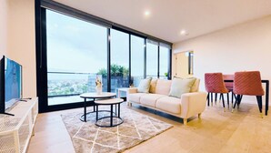 Apartemen Elite, pemandangan kota | Ruang keluarga