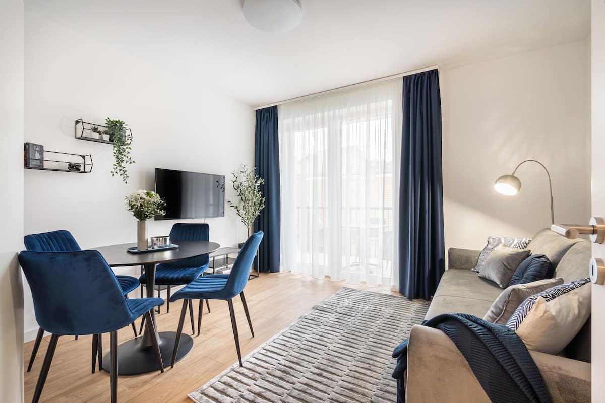 Superior Apartment, Courtyard View | Living area | Flat-screen TV