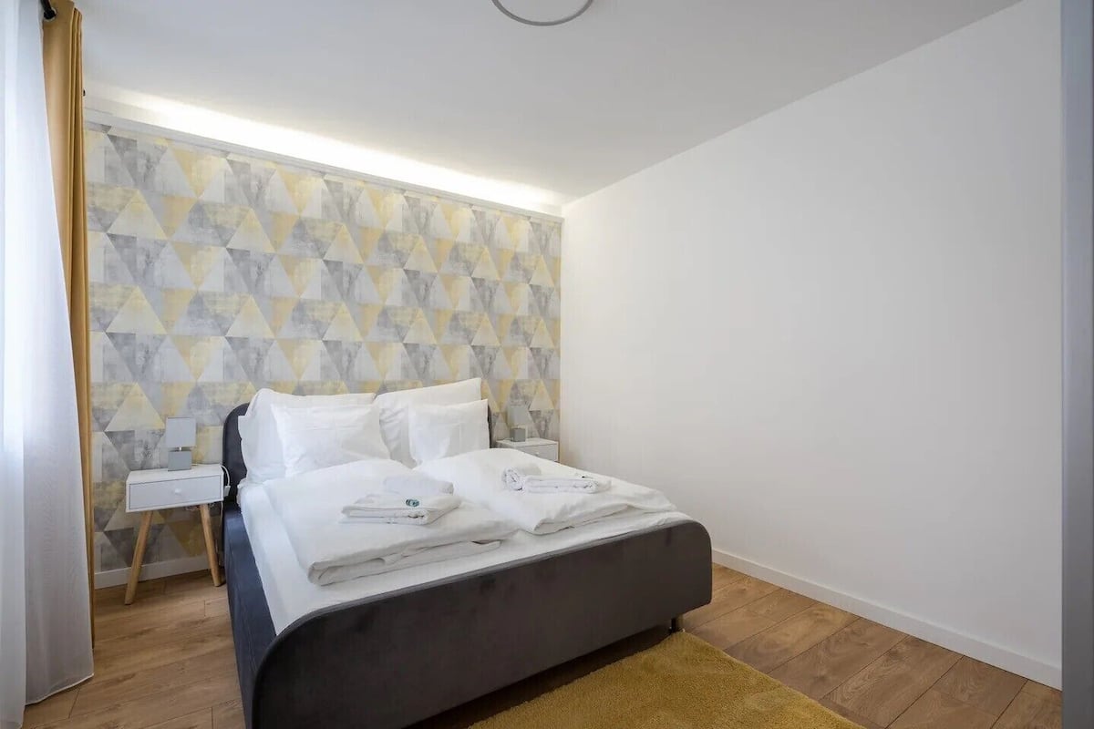 Deluxe Apartment, Courtyard View | 3 bedrooms, blackout curtains, soundproofing, iron/ironing board