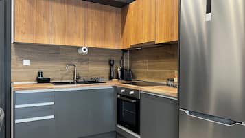 Refrigerador, horno, cafetera y tetera y tostadora