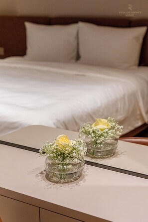 Junior Apartment, Balcony, Sea View | In-room safe, desk, laptop workspace, blackout curtains - Icity Mozart Suites (Dong Hoi)