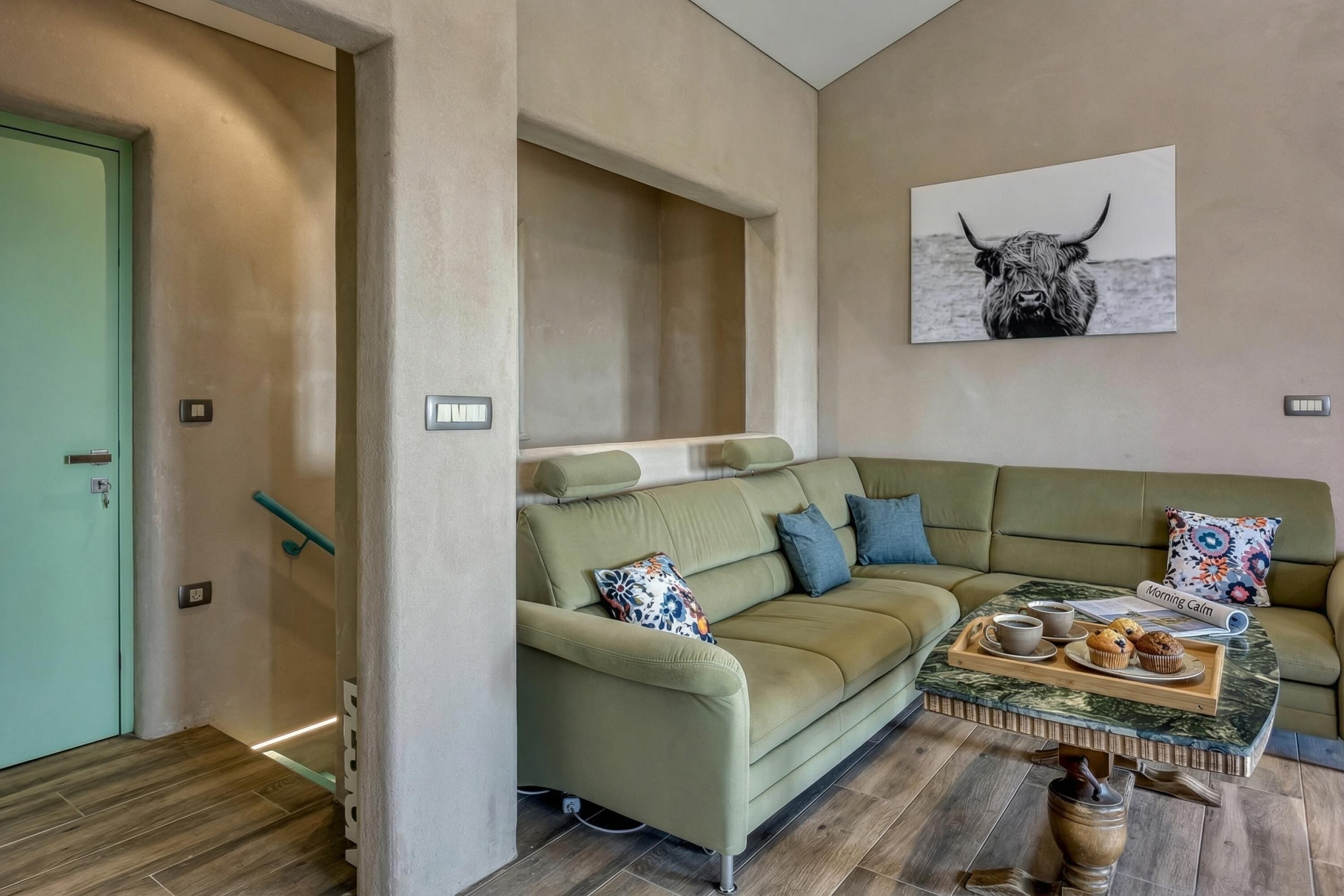 Familievilla, flere soverom (Pool Vila Olivia with Sauna) | Oppholdsområde | En 21-tommers Flatskjerm-TV med digitale kanaler samt TV