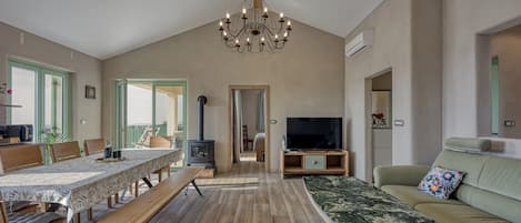 Family Villa, Multiple Bedrooms (Pool Vila Olivia with Sauna) | Living area | 21-inch flat-screen TV with digital channels, TV