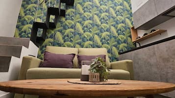 Deluxe appartement | Woonruimte | Een flatscreentelevisie