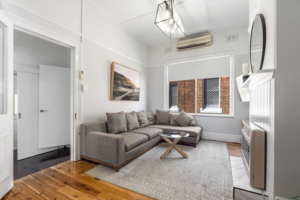 Living area - Incredible Location! 2 Bed CBD Dream (Orange)