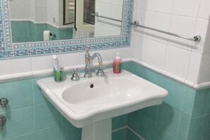 Hair dryer, bidet, towels, soap