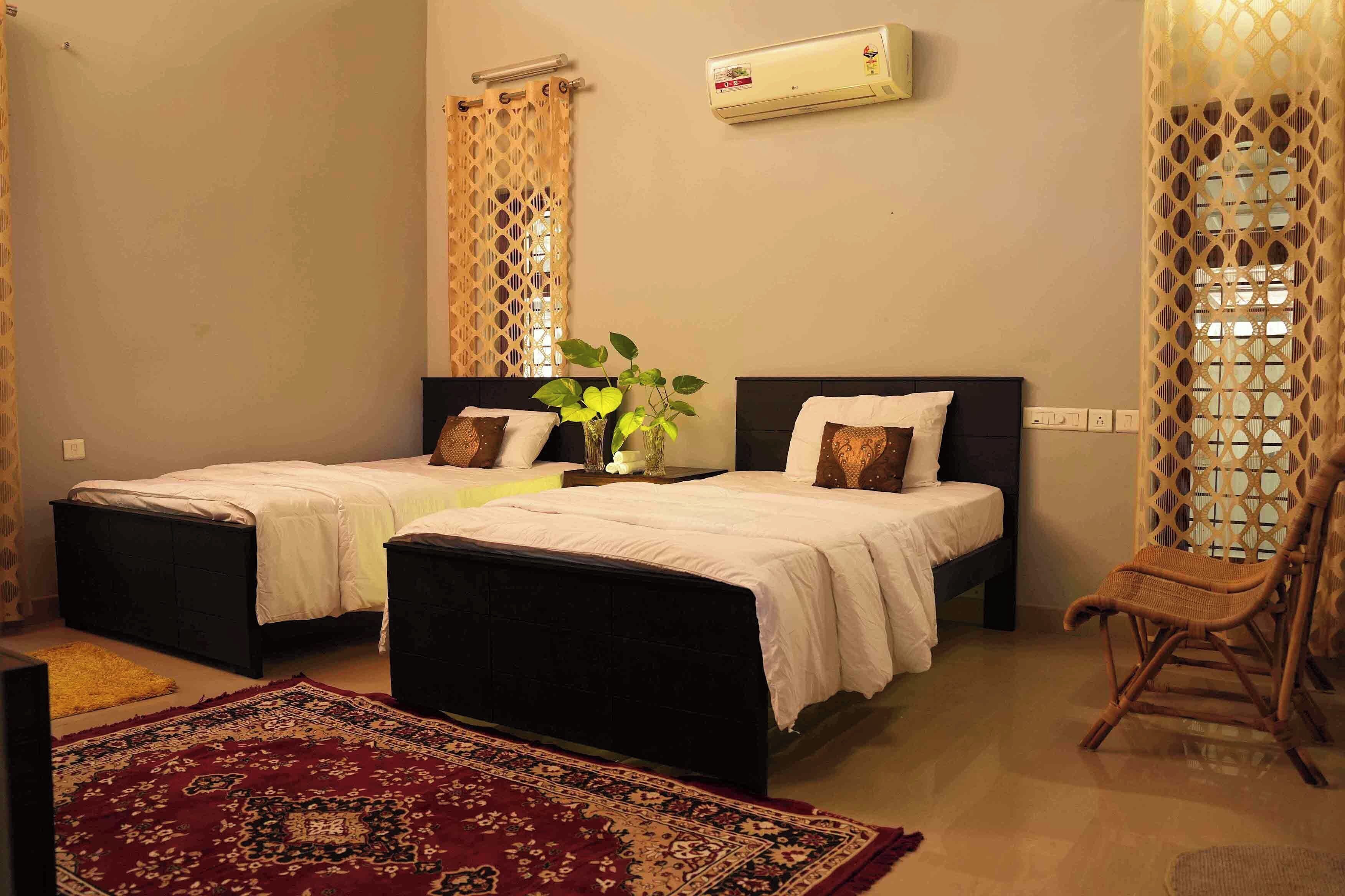 Deluxe Room, Multiple Beds, Non Smoking, Private Bathroom | Desk, laptop workspace, iron/ironing board, free WiFi