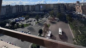 A cityscape with high-rise buildings, a busy road, and a clear sky with clouds. - ALTA DIMORA b&b suites (Catania)