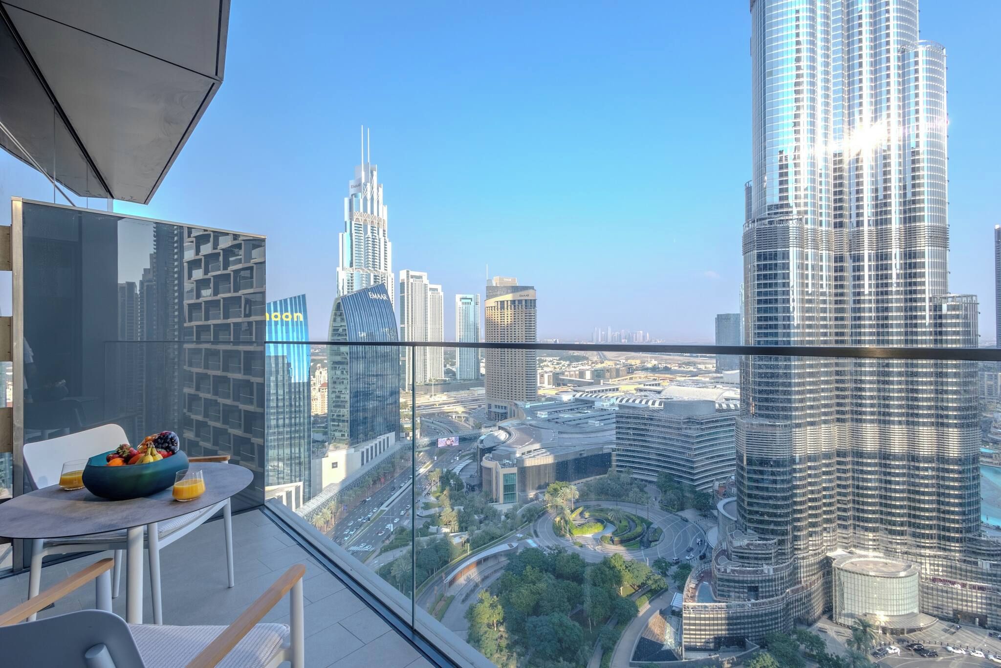 A high-rise building with a view of the cityscape.
