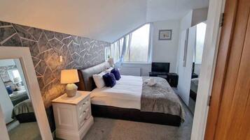 4 habitaciones, tabla de planchar con plancha, cuna de viaje y wifi