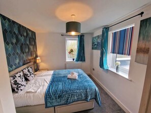 4 bedrooms, iron/ironing board, travel cot, WiFi