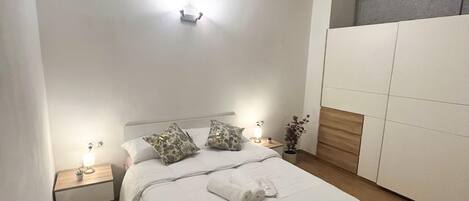 1 غرفة نوم ومكواة/لوح كي وواي فاي وملاءات أسرّة