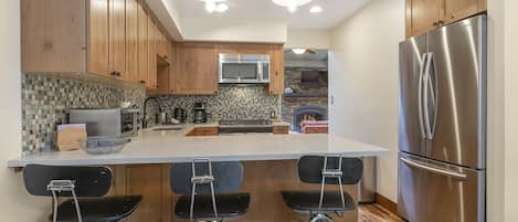 Townhome, 3 Bedrooms | Private kitchen | Fridge, oven, coffee/tea maker, toaster