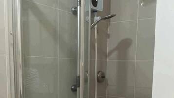 Shower, bidet, towels, soap