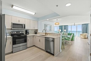 Fridge, microwave, oven, stovetop - Luxurious 3-bedroom, 3-bathroom oceanfront condo, 7th floor views | Windy Hill Dunes - 703 (North Myrtle Beach)