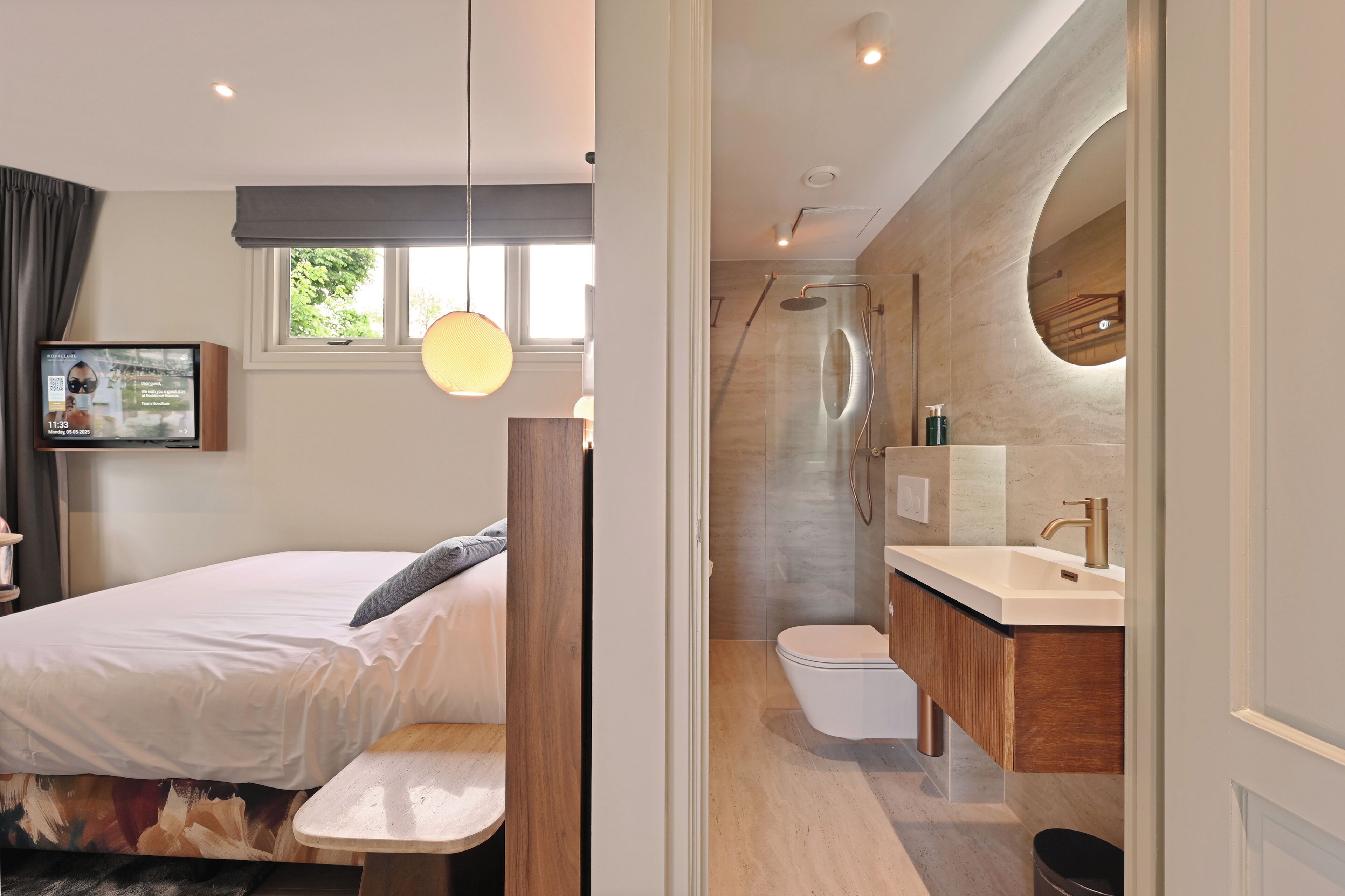 Deluxe Studio | Bathroom | Shower, hair dryer, towels, soap