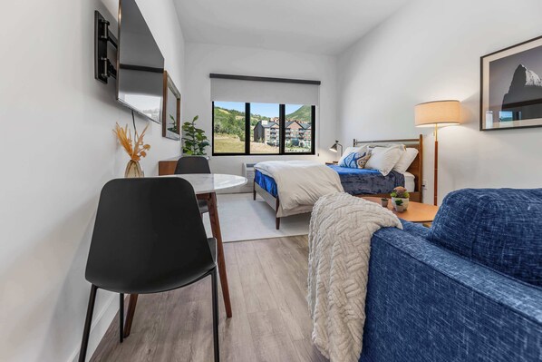 Iron/ironing board, travel crib, WiFi, bed sheets