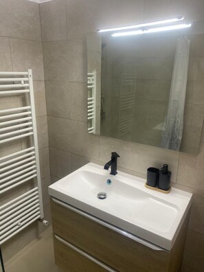 Hair dryer, towels, soap, toilet paper