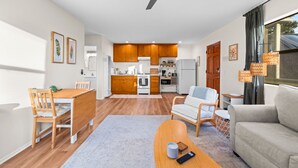 A modern living room with a dining area, kitchen, and a ceiling fan. - 25% Off Sept 24-27 Amazing Reviews, Walk To Beach* (Ventura)