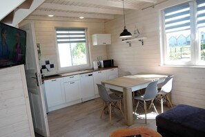 Deluxe House, 3 Bedrooms | Private kitchen | Fridge, coffee/tea maker, electric kettle, highchair